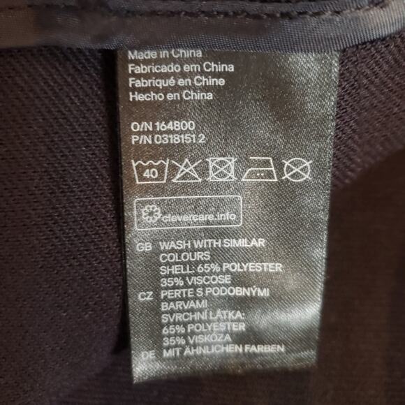 H&M Mini Skirt Women 10 Black Ribbed Patch Pockets and Stud Details Back Zip - Picture 4 of 4